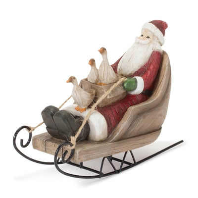 Santa On Sled Figurine
