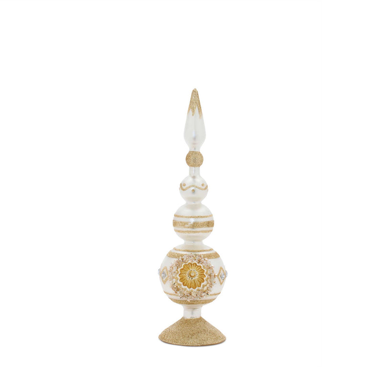 white and gold finial