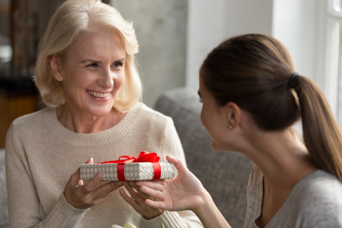 A daughter gives the perfect religious Christmas gift to mom