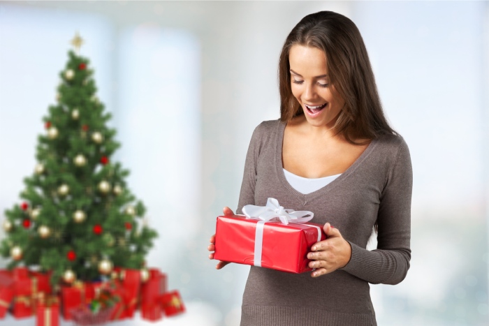 A woman getting a gift